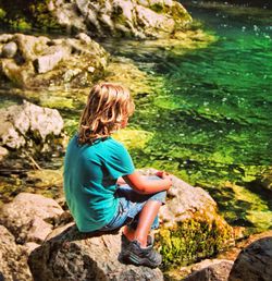 Woman standing on rocks