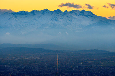 Close-up of mountain against sky during sunset