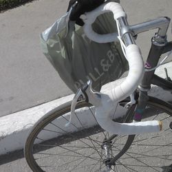 Close-up of bicycle against wall