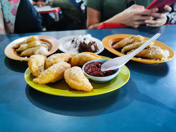 High angle view of food served on table in restaurant