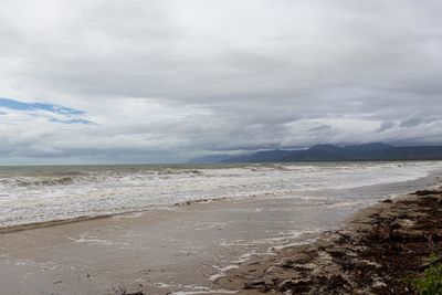 Scenic view of beach against sky