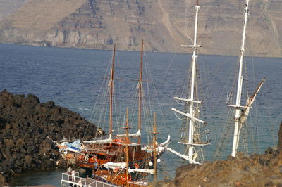 High angle view of sailboats in sea