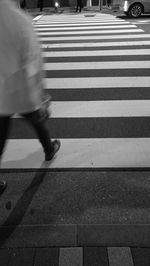 Blurred motion of people walking on street