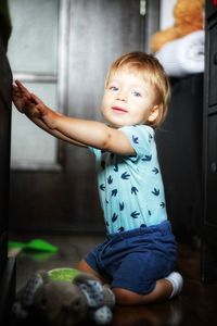 Portrait of cute boy at home