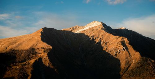 Scenic view of mountain range against sky