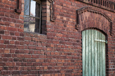 Exterior of old building with closed door