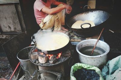 Midsection of woman preparing food