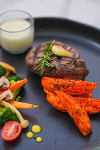 Close-up of food in plate on table