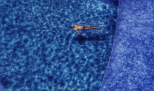 Close-up of water against blue sky