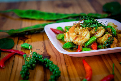 High angle view of chopped vegetables on table