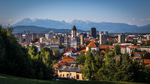 Buildings in city against sky