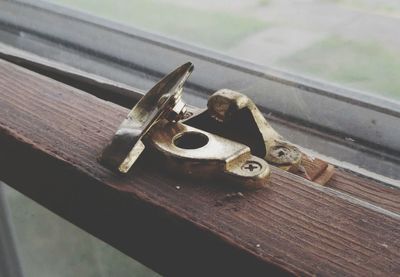 High angle view of rusty metal on table