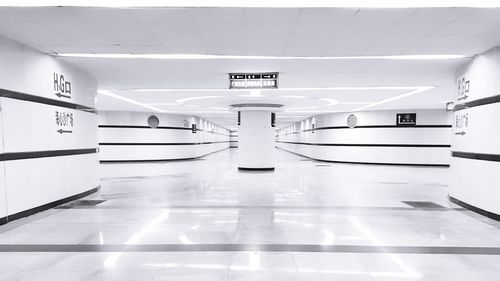 Empty illuminated underground walkway