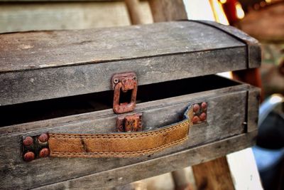 Close-up of old suitcase