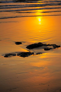 Scenic view of sea at sunset