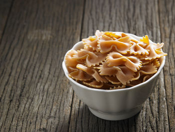 Close-up of farfalle pasta on table