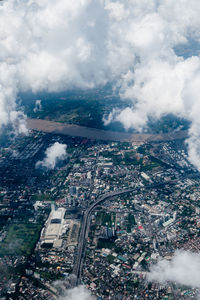 Aerial view of cityscape against sky