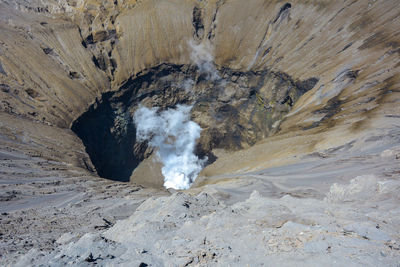 The hole and crater smoke mount bromo, indonesia