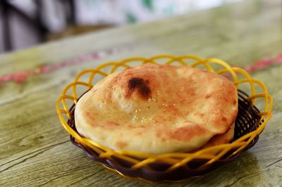 High angle view of bread in basket on table