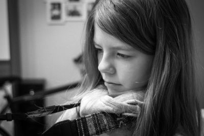 Close-up of thoughtful girl at home