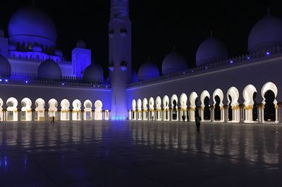 Illuminated mosque at night