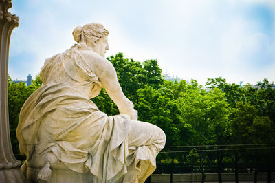 Low angle view of statue against sky