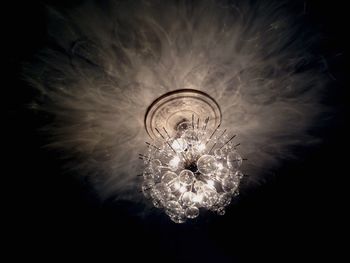 Low angle view of illuminated chandelier