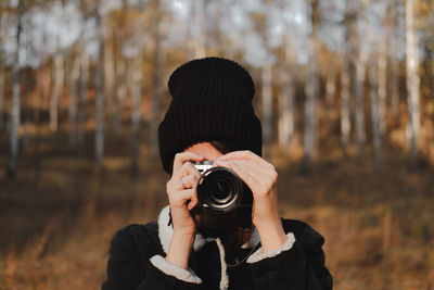 Portrait of man photographing