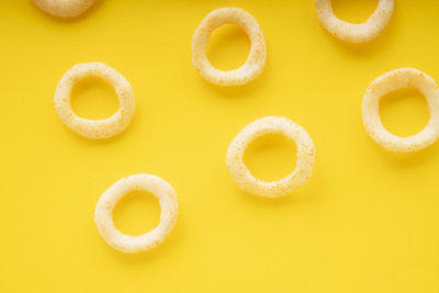 Directly above shot of yellow slices on table