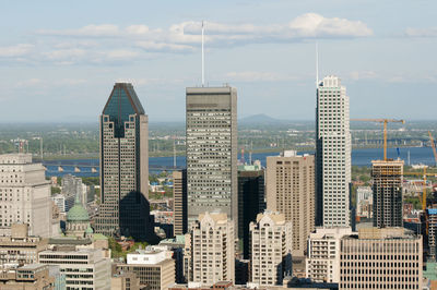 Modern cityscape against sky