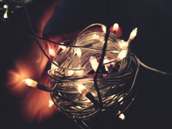 Close-up of illuminated light bulb