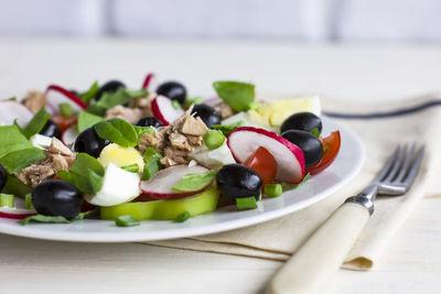 Close-up of salad served in plate on table