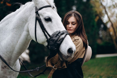 Close-up of horse standing on field