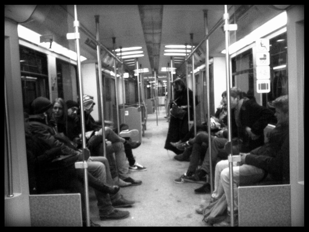 men, indoors, lifestyles, person, transportation, transfer print, leisure activity, public transportation, sitting, mode of transport, medium group of people, auto post production filter, occupation, city life, architecture, passenger