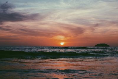 Scenic view of sea against sky during sunset