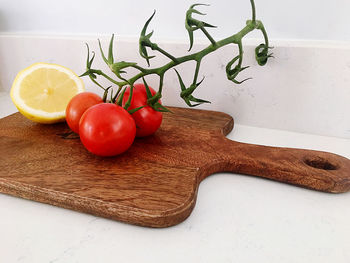 High angle view of tomatoes on cutting board