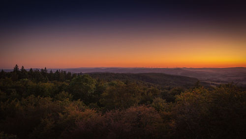 Scenic view of landscape against sky during sunset