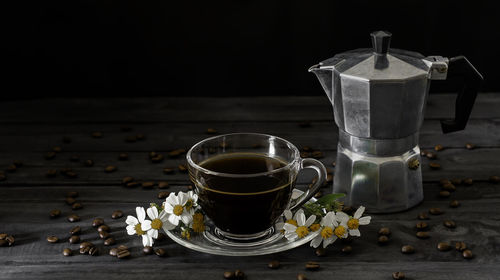 Close-up of coffee cup on table