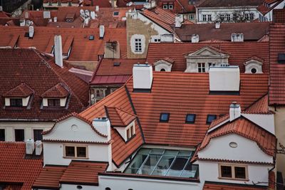 Houses in town against sky