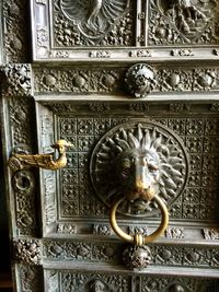 Close-up of sculpture on door