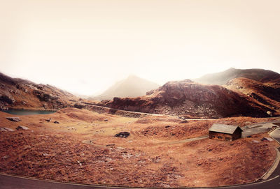 Scenic view of mountains against clear sky
