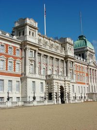 Facade of building against clear blue sky