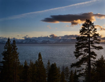 Scenic view of lake against sky during sunset