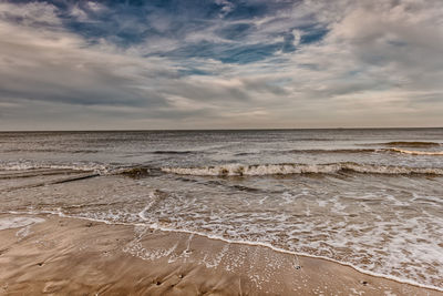 View of sea against cloudy sky