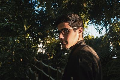 Portrait of young man looking away