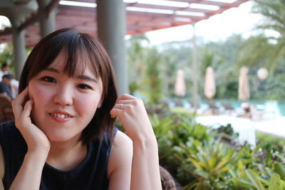 Close-up portrait of smiling woman