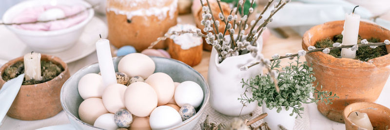 Happy easter and spring holidays time. festive tablescape set decor. traditional easter dinner food 