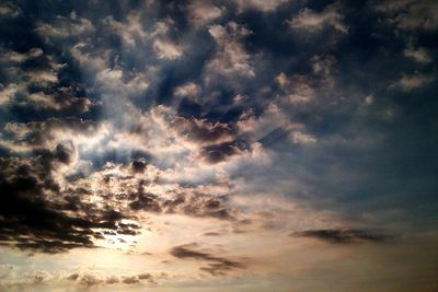 Low angle view of dramatic sky during sunset