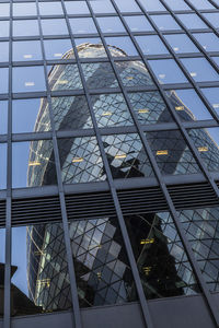 Low angle view of modern building against sky