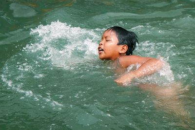 Close-up of boy in swimming pool